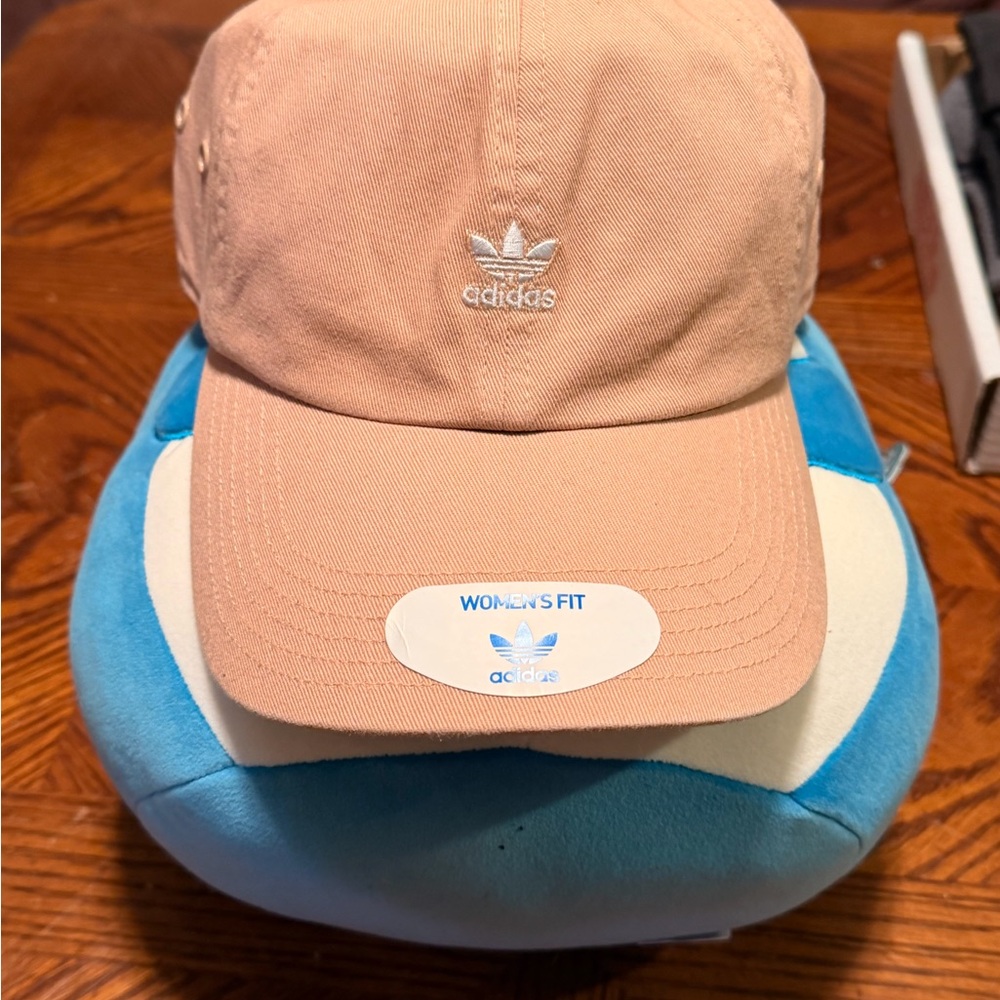 Adidas Strap-back adjustable Peach small emblem.